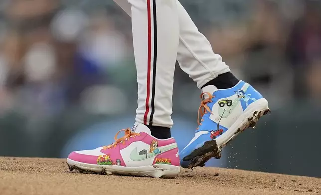 The cleats worn by Minnesota Twins starting pitcher Bailey Ober (17) are pictured during the first inning of a baseball game against the Detroit Tigers Thursday, Aug. 14, 2025, in Minneapolis. (AP Photo/Abbie Parr)