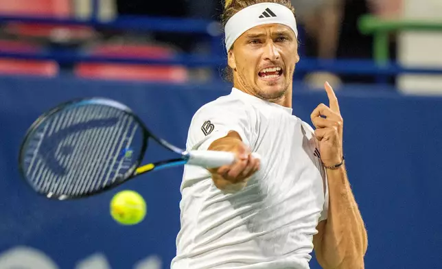 Alexander Zverev of Germany hits a forehand return to Francisco Cerundolo of Argentina during their match at the National Bank Open in Toronto, Saturday, Aug. 2, 2025. (Frank Gunn/The Canadian Press via AP)