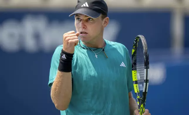 Alex Michelsen of the United States celebrates on his way to defeating Learner Tien of the United States at the National Bank Open in Toronto, on Saturday, Aug. 2, 2025. (Frank Gunn/The Canadian Press via AP)