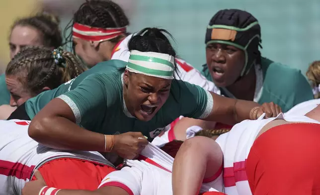 Ireland's Eimar Corri-Fallon shouts in the scrum during the group C match at the 2025 Women's Rugby World Cup between Ireland and Spain, at Franklin's Gardens, Northampton, England, Sunday, Aug. 31, 2025. (AP Photo/Dave Shopland)