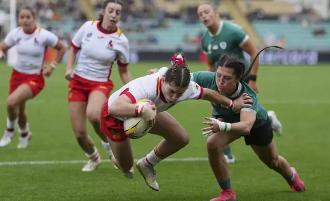 Spain's Claudia Cano scores a try during the group C match at the 2025 Women's Rugby World Cup between Ireland and Spain, at Franklin's Gardens, Northampton, England, Sunday, Aug. 31, 2025. (AP Photo/Dave Shopland)