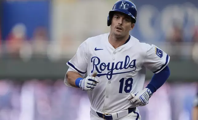 Kansas City Royals' Mike Yastrzemski runs the bases after hitting a solo home run during the first inning of a baseball game against the Texas Rangers, Monday, Aug. 18, 2025, in Kansas City, Mo. (AP Photo/Charlie Riedel)