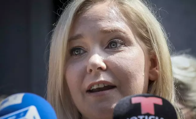 FILE - Virginia Giuffre speaks during a news conference outside a Manhattan court in New York, Aug. 27, 2019. (AP Photo/Bebeto Matthews, File)