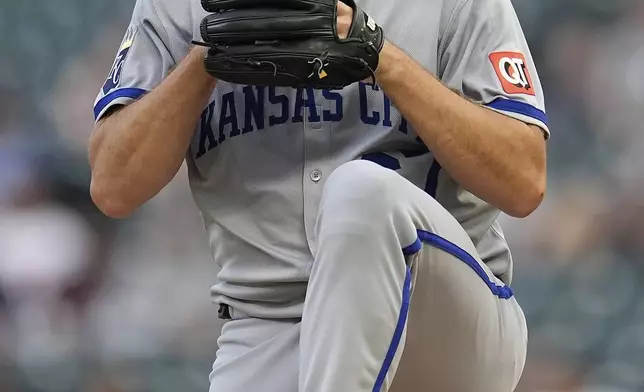 Kansas City Royals starting pitcher Seth Lugo (67) winds up to deliver during the first inning of a baseball game against the Minnesota Twins, Friday, Aug. 8, 2025, in Minneapolis. (AP Photo/Abbie Parr)