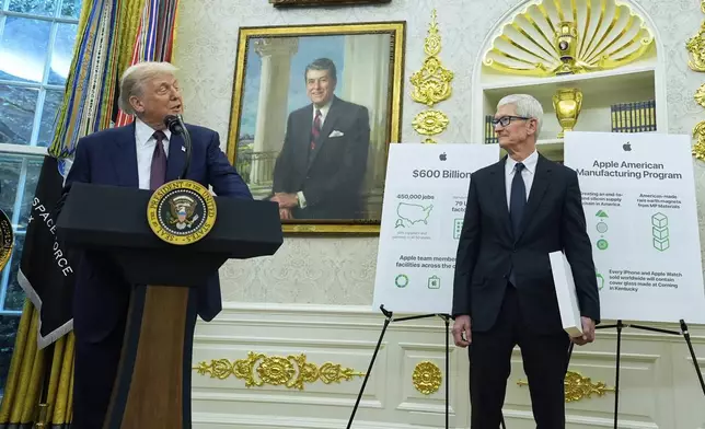 President Donald Trump makes an announcement about Apple with Apple CEO Tim Cook in the Oval Office, Wednesday, Aug. 6, 2025, in Washington. (AP Photo/Alex Brandon)