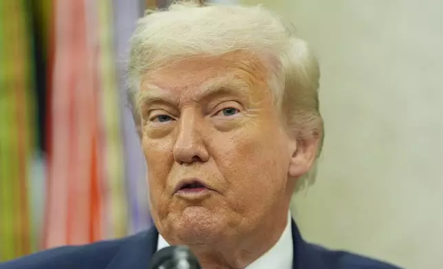 President Donald Trump makes an announcement about Apple in the Oval Office, Wednesday, Aug. 6, 2025, in Washington. (AP Photo/Alex Brandon)