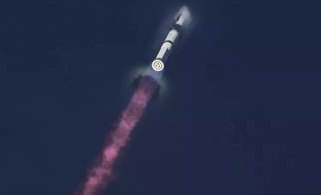 SpaceX's mega rocket Starship makes a test flight from Starbase, Texas, Tuesday, Aug. 26, 2025. (AP Photo/Eric Gay)