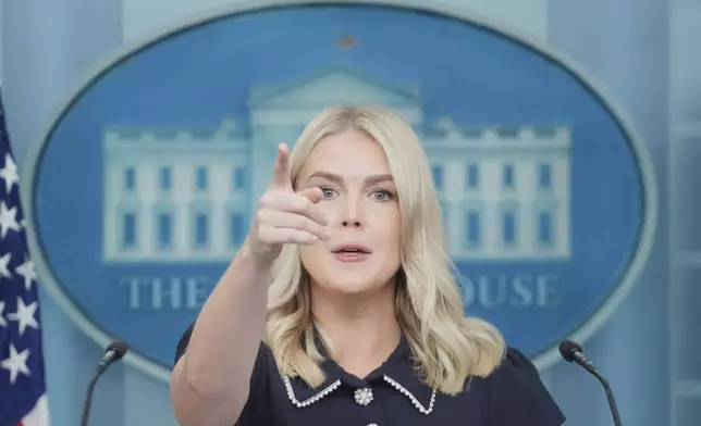 White House press secretary Karoline Leavitt speaks with reporters in the James Brady Press Briefing Room at the White House, Tuesday, Aug. 12, 2025, in Washington. (AP Photo/Mark Schiefelbein)