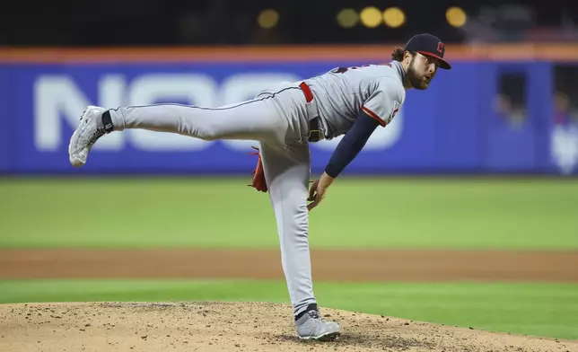 Cleveland Guardians starting pitcher Slade Cecconi throws during the fifth inning of a baseball game against the New York Mets at Citi Field in New York, Monday, Aug. 4, 2025. (Gordon Donovan via AP)