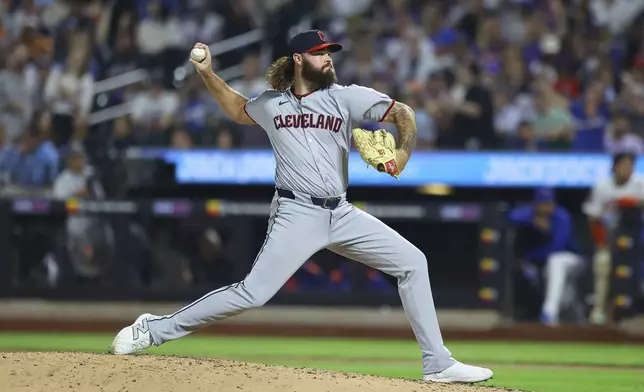 Cleveland Guardians pitcher Hunter Gaddis throws during the eighth inning of a baseball game against the New York Mets at Citi Field in New York, Monday, Aug. 4, 2025. (Gordon Donovan via AP)