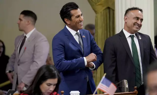California Assembly Speaker Robert Rives smiles after the Assembly approved the first of three measures to redraw the state's Congressional districts and put new maps before voters in a special election, during a news conference in Sacramento, Calif., Thursday, Aug. 21, 2025. (AP Photo/Rich Pedroncelli)