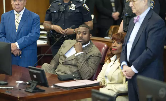 Former NYC Mayor Eric Adam's Chief of Staff Ingrid Lewis-Martin and son Glenn Martin II appear for arraignment on corruption charges in Manhattan criminal court, Thursday, Aug. 21, 2025, in New York. (Steven Hirsch/New York Post via AP, Pool)