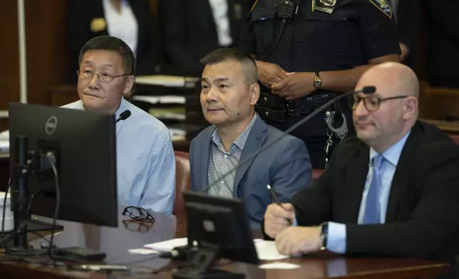 Real Estate developer Tian Li appears for arraignment on corruption charges in Manhattan criminal court, Thursday, Aug. 21, 2025, in New York. (Steven Hirsch/New York Post via AP, Pool)
