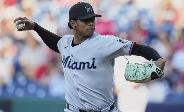Miami Marlins starting pitcher Edward Cabrera pitches in the first inning of a baseball game against the Cleveland Guardians in Cleveland, Thursday, Aug. 14, 2025. (AP Photo/Sue Ogrocki)