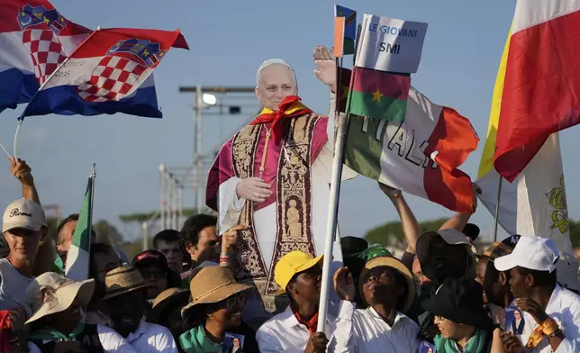 Young people participate in the Youths Jubilee at the Tor Vergata field in Rome, Saturday, Aug. 2, 2025. (AP Photo/Gregorio Borgia)