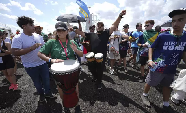 Young people participate in the Youths Jubilee at the Tor Vergata field in Rome, Saturday, Aug. 2, 2025. (AP Photo/Andrew Medichini)