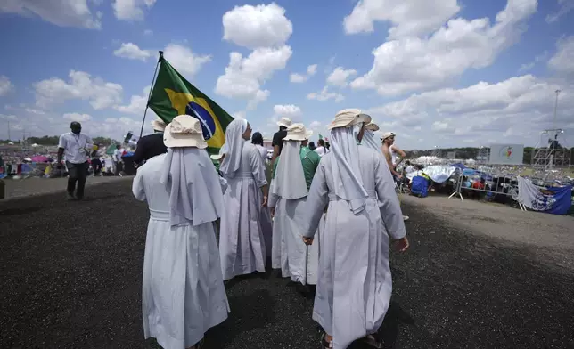 Young people participate in the Youths Jubilee at the Tor Vergata field in Rome, Saturday, Aug. 2, 2025. (AP Photo/Andrew Medichini)