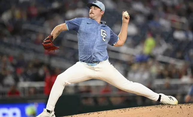 Washington Nationals starting pitcher Mitchell Parker throws during the fourth inning of a baseball game against the Milwaukee Brewers, Friday, Aug. 1, 2025, in Washington. (AP Photo/Nick Wass)