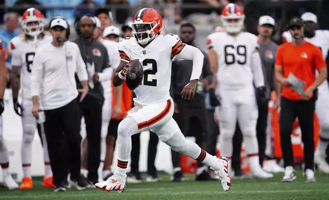 Cleveland Browns quarterback Shedeur Sanders runs against the Carolina Panthers during the first half of a preseason NFL football game on Friday, Aug. 8, 2025, in Charlotte, N.C. (AP Photo/Jacob Kupferman)