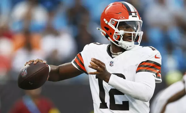 Cleveland Browns quarterback Shedeur Sanders passes against the Carolina Panthers during the first half of a preseason NFL football game on Friday, Aug. 8, 2025, in Charlotte, N.C. (AP Photo/Rusty Jones)