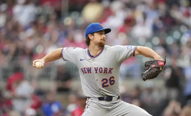 New York Mets pitcher Nolan McLean (26) delivers in the first inning of a baseball game against the Atlanta Braves, Friday, Aug. 22, 2025, in Atlanta. (AP Photo/Brynn Anderson)