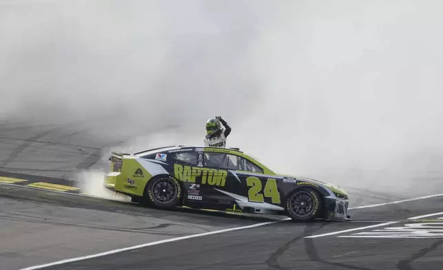 William Byron celebrates after winning a NASCAR Cup Series auto race, Sunday, Aug. 3, 2025, at Iowa Speedway in Newton, Iowa. (AP Photo/Bryon Houlgrave)
