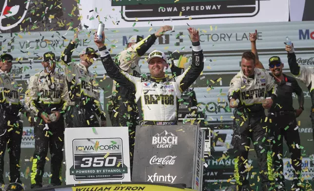 William Byron celebrates after winning a NASCAR Cup Series auto race, Sunday, Aug. 3, 2025, at Iowa Speedway in Newton, Iowa. (AP Photo/Bryon Houlgrave)