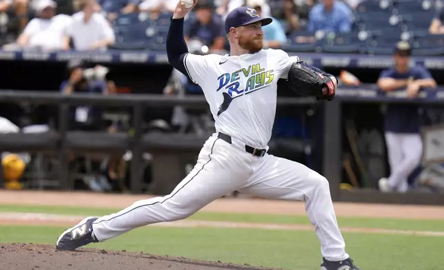 Tampa Bay Rays' Drew Rasmussen pitches to the Los Angeles Dodgers during the third inning of a baseball game Saturday, Aug. 2, 2025, in Tampa, Fla. (AP Photo/Chris O'Meara)