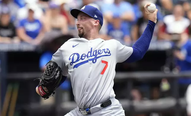 Los Angeles Dodgers pitcher Blake Snell delivers to the Tampa Bay Rays during the first inning of a baseball game Saturday, Aug. 2, 2025, in Tampa, Fla. (AP Photo/Chris O'Meara)