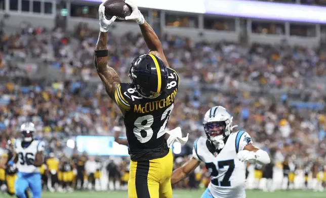 Pittsburgh Steelers wide receiver Lance McCutcheon catches a touchdown pass against the Carolina Panthers during the first half of an NFL preseason football game, Thursday, Aug. 21, 2025, in Charlotte, N.C. (AP Photo/Scott Kinser)