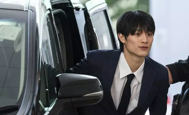 J-pop star Kenshin Kamimura arrives at the West Kowloon Magistrates' Courts to hear verdict over his indecent assault case in Hong Kong, Wednesday, August 13, 2025. (AP Photo/Chan Long Hei)