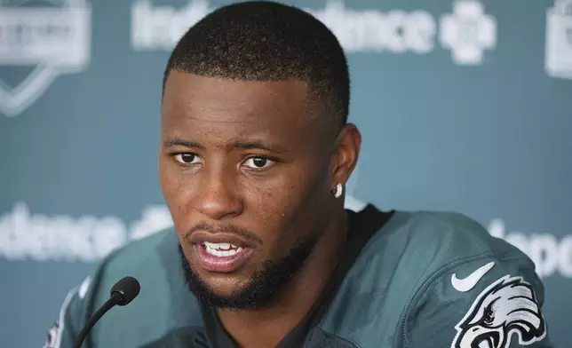 Philadelphia Eagles running back Saquon Barkley speaks during a news conference at the team’s NFL football training camp, Wednesday, July 23, 2025, in Philadelphia. (AP Photo/Matt Rourke)