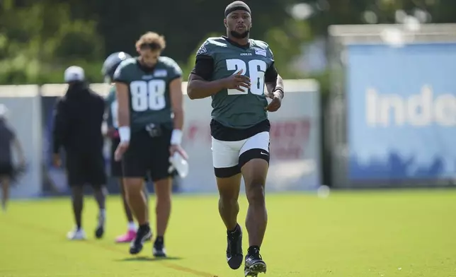 Philadelphia Eagles running back Saquon Barkley runs during practice at the team’s NFL football training camp, Thursday, July 24, 2025, in Philadelphia. (AP Photo/Matt Rourke)