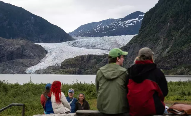 People view Mendenhall Glacier from the Mendenhall Glacier Visitors Center area, Sunday, Aug. 3, 2025, in Juneau, Alaska. (Marc Lester/Anchorage Daily News via AP)