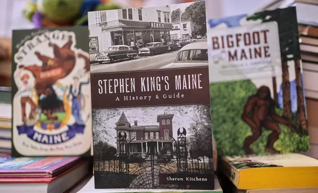 Stephen King's Maine, by Sharon Kitchens, center, and two books by Michelle Souliere are among The History Press books for sale at the Green Hand Bookstore in Portland, Maine, on Thursday, Aug. 7, 2025. (AP Photo/Robert F. Bukaty)