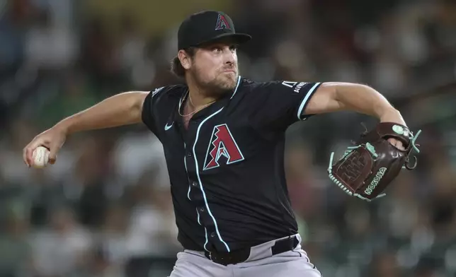 Arizona Diamondbacks pitcher Kevin Ginkel throws to an Athletics batter during the ninth inning of a baseball game Saturday, Aug. 2, 2025, in West Sacramento, Calif. (AP Photo/Scott Marshall)
