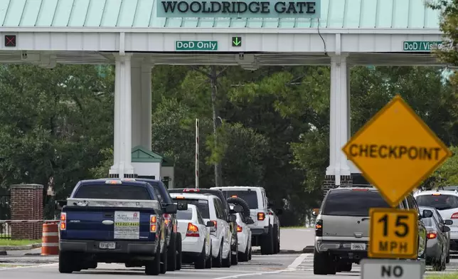 Wooldridge Gate at Fort Stewart in Georgia is seen on Wednesday, Aug. 6, 2025. (AP Photo/Mike Stewart)