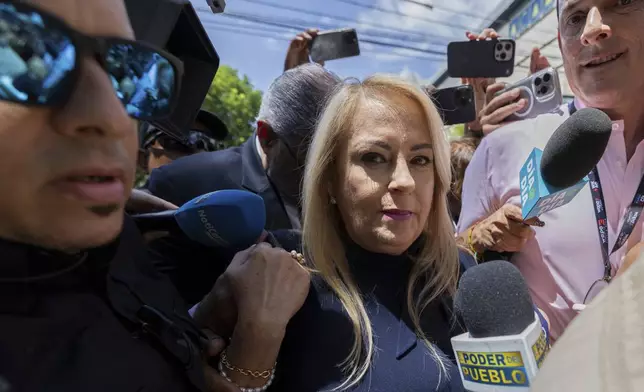 Former Puerto Rico Gov. Wanda Vázquez arrives at the federal courthouse in San Juan, Puerto Rico, Wednesday, Aug. 27, 2025. (AP Photo/Alejandro Granadillo)