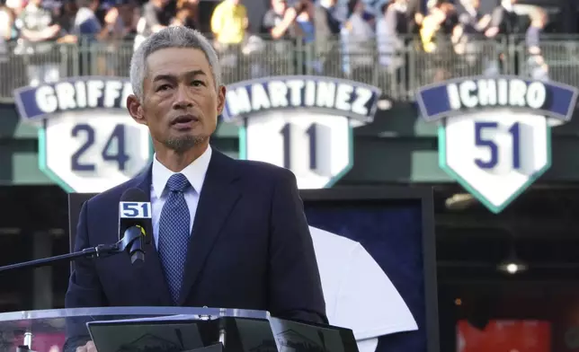 Former Seattle Mariners right fielder Ichiro Suzuki speaks during his jersey retirement ceremony on Saturday, Aug. 9, 2025, before a baseball game between the Mariners and the Tampa Bay Rays in Seattle. (AP Photo/Lindsey Wasson)