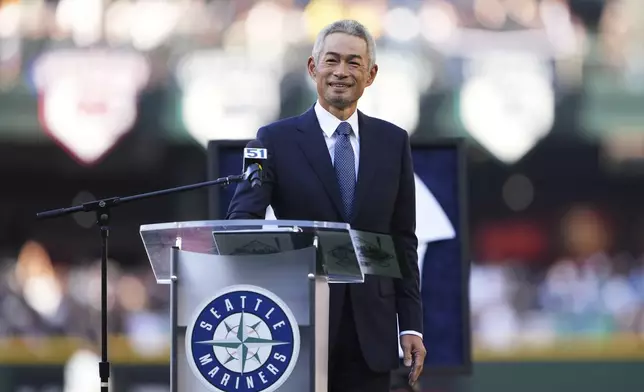Former Seattle Mariners right fielder Ichiro Suzuki speaks during his jersey retirement ceremony on Saturday, Aug. 9, 2025, before a baseball game between the Mariners and the Tampa Bay Rays in Seattle. (AP Photo/Lindsey Wasson)