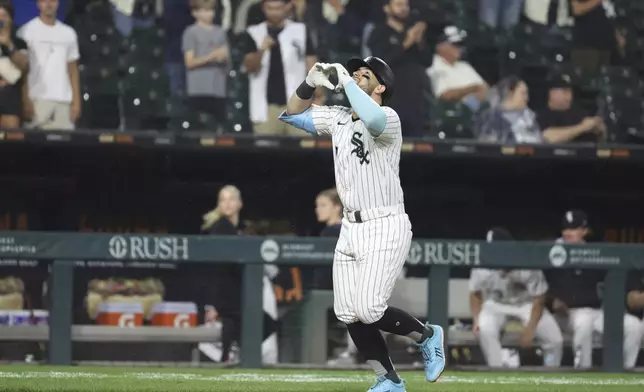 Chicago White Sox designated hitter Edgar Quero (7) hits a home run during the seventh inning against the Detroit Tigers in a baseball game, Tuesday, Aug. 12, 2025, in Chicago. (AP Photo/Talia Sprague)