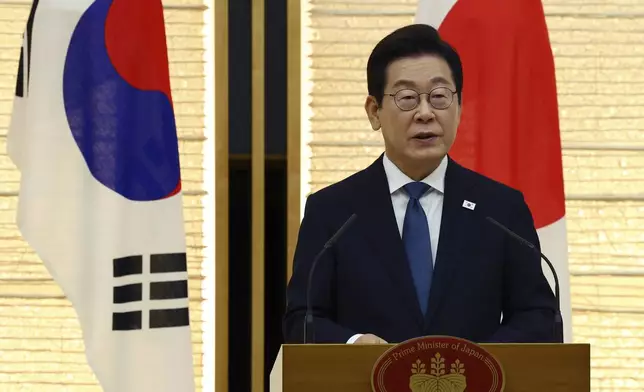South Korean President Lee Jae Myung speaks at joint press announcement with Japan's Prime Minister Shigeru Ishiba (not in the picture) after the summit in Tokyo, Saturday, Aug. 23, 2025. (Kim Kyung-Hoon/Pool Photo via AP)