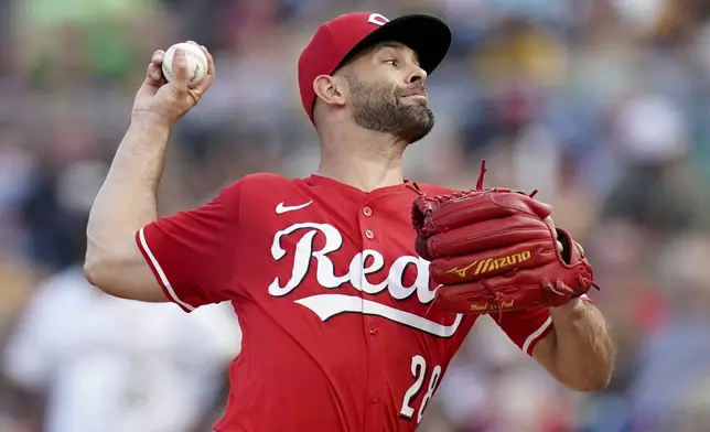 Cincinnati Reds pitcher Nick Martinez delivers during the first inning of a baseball game against the Pittsburgh Pirates Saturday, Aug. 9, 2025, in Pittsburgh. (AP Photo/Matt Freed)
