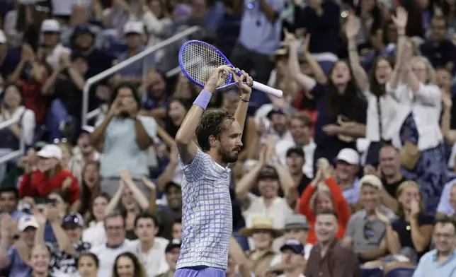Daniil Medvedev, of Russia, reacts during a match against Benjamin Bonzi, of France, in the first-round of the U.S. Open tennis championships, Sunday, Aug. 24, 2025, in New York. (AP Photo/Adam Hunger)