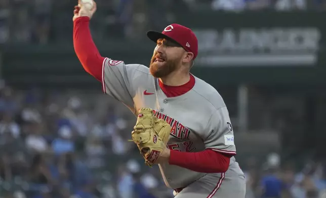 Cincinnati Reds starting pitcher Zack Littell throws against the Chicago Cubs during the first inning of a baseball game in Chicago, Tuesday, Aug. 5, 2025. (AP Photo/Nam Y. Huh)