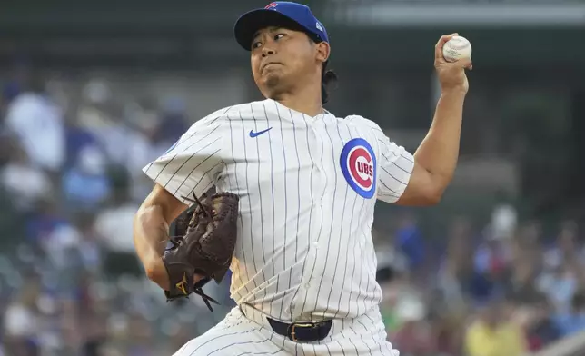 Chicago Cubs starting pitcher Shota Imanaga, of Japan, throws against the Cincinnati Reds during the first inning of a baseball game in Chicago, Tuesday, Aug. 5, 2025. (AP Photo/Nam Y. Huh)
