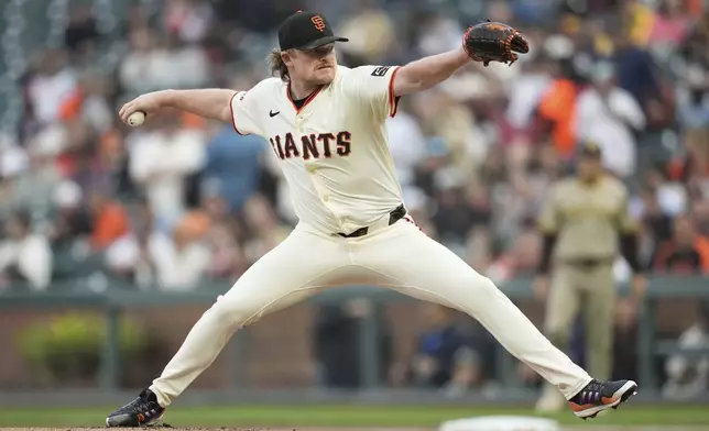 San Francisco Giants pitcher Logan Webb throws against the San Diego Padres during the first inning of a baseball game in San Francisco, Monday, Aug. 11, 2025. (AP Photo/Jeff Chiu)