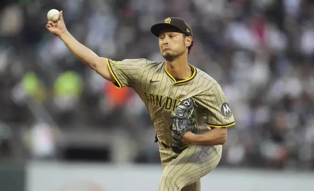 San Diego Padres pitcher Yu Darvish throws against the San Francisco Giants during the third inning of a baseball game in San Francisco, Monday, Aug. 11, 2025. (AP Photo/Jeff Chiu)