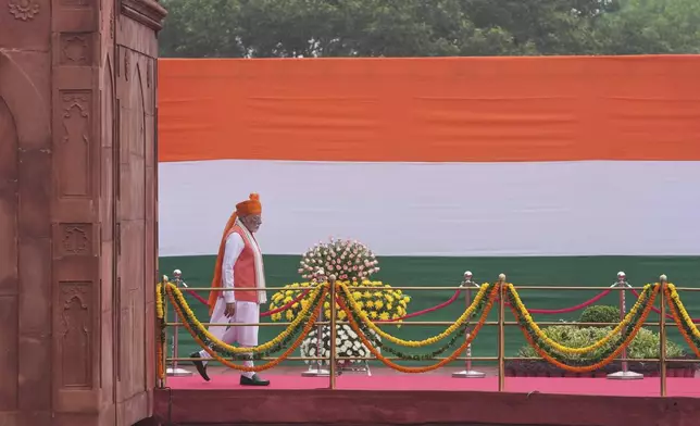 Indian Prime Minister Narendra Modi arrives to address the nation from the rampart of the 17th century Mughal-era Red Fort monument during the country's Independence Day celebrations in New Delhi, India, Friday, Aug. 15, 2025. (AP Photo/Manish Swarup)