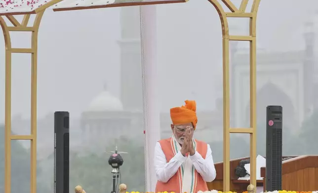 Indian Prime Minister Narendra Modi greets the invitees after addressing the nation from the rampart of the 17th century Mughal-era Red Fort monument during the country's Independence Day celebrations in New Delhi, India, Friday, Aug. 15, 2025. (AP Photo/Manish Swarup)
